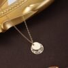 10b9de57-44b3-40dd-85b7-b545fc13f87b.jpg Vintage Geometric Pattern Pendant Necklace