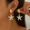 1d68fc0e-9998-45f0-874b-a637293aaaa4.jpg Ocean Muse Drop Earrings Starfish & Shell Statement Pair