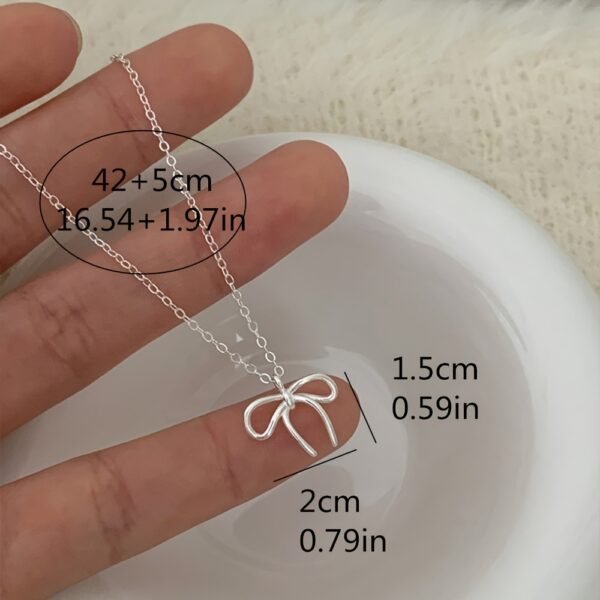 82c4dc4e-a1c2-423e-a7db-65b59141bef0.jpg Elegant Alloy Bowknot Necklace for Women