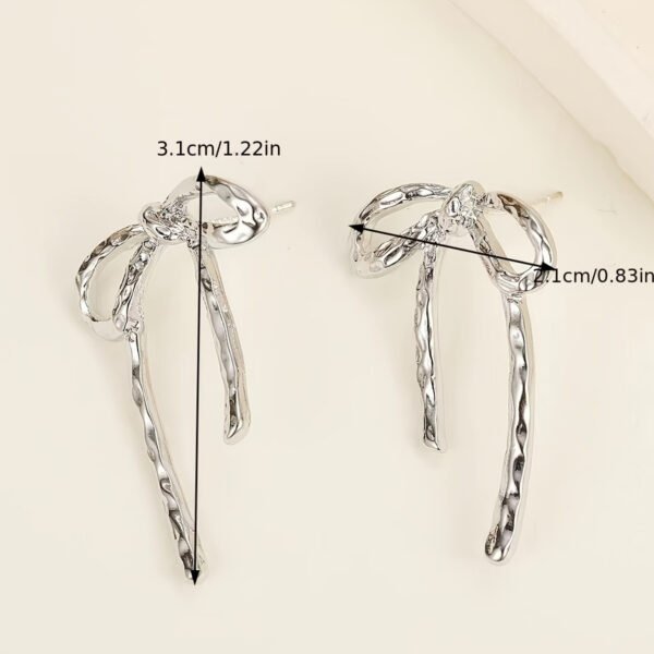 e8f8e74e-1b4a-11ef-8971-0a580a682b00.jpg Trendy Hollow-Out Bow Stud Earrings