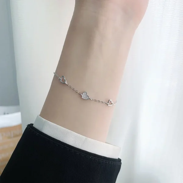 my-11134207-820l8-mfm1wl83uhoo5d.webp Three Heart CZ Bracelet