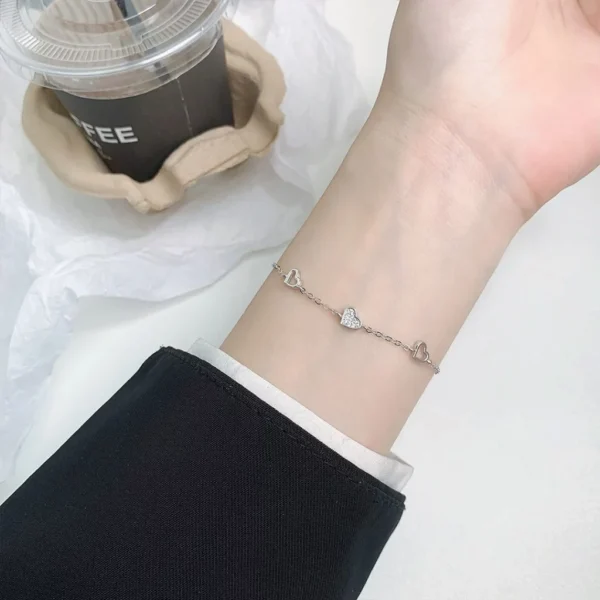 my-11134207-820l9-mfm1wmzs9b0t54.webp Three Heart CZ Bracelet