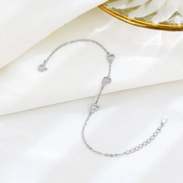 my-11134207-820lc-mfm1wovqaa6nd4.webp Three Heart CZ Bracelet