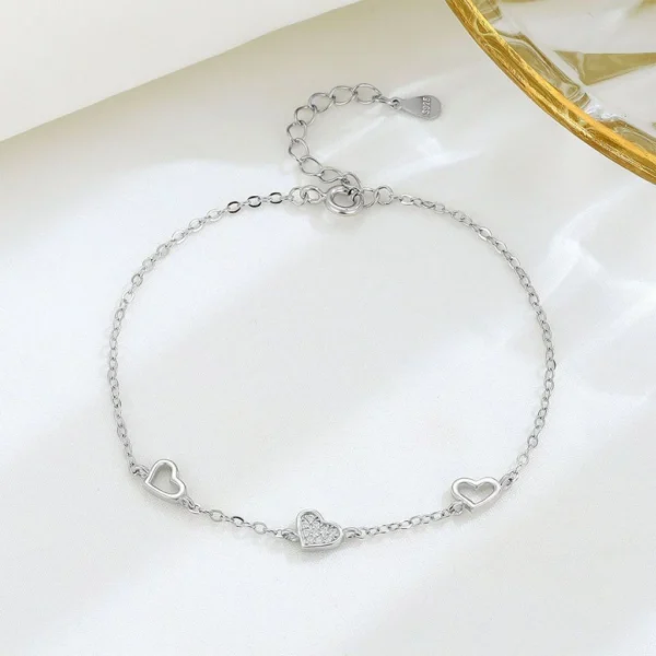 my-11134207-820lf-mfm1wqkfo3rc98.webp Three Heart CZ Bracelet