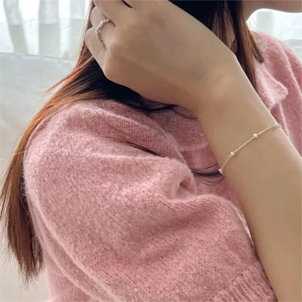 sg-11134201-7rdwu-mcb2jihoxyfl71.webp Silver Pearl Chain Bracelet